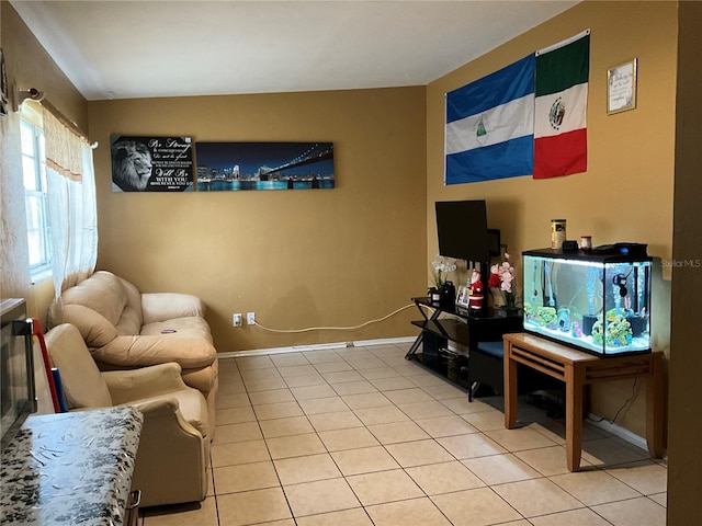 living room featuring light tile patterned flooring