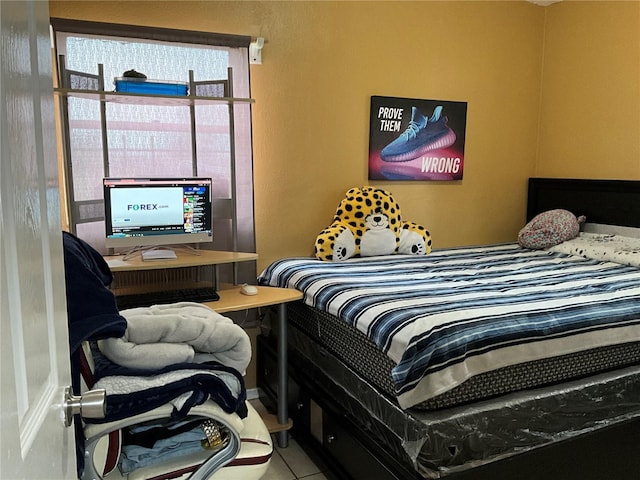 bedroom with tile patterned flooring