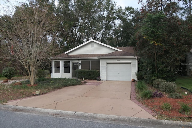 single story home with a garage