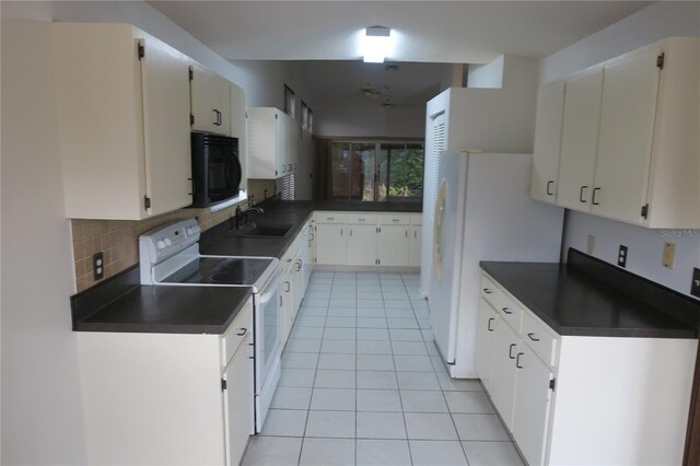 kitchen featuring white cabinetry, sink, decorative backsplash, light tile patterned floors, and white appliances