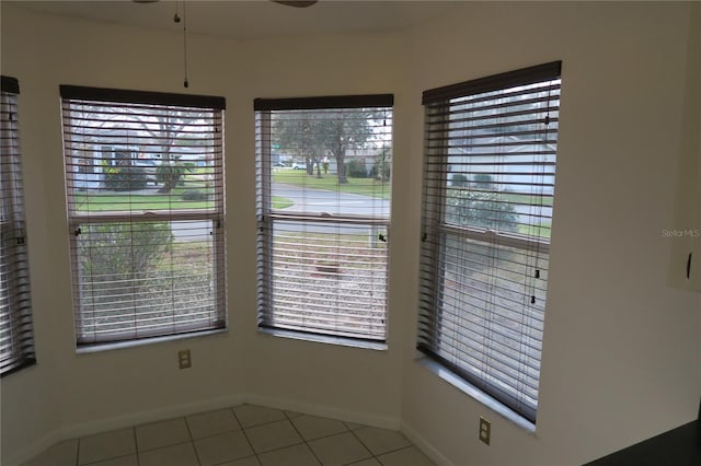 interior space with tile patterned flooring and plenty of natural light