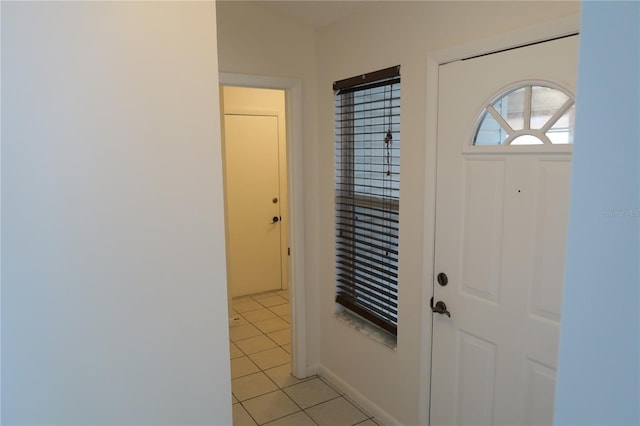 entrance foyer with light tile patterned flooring