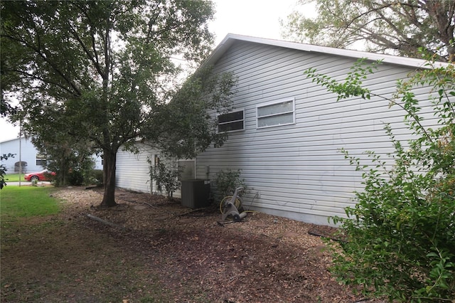 view of property exterior with cooling unit