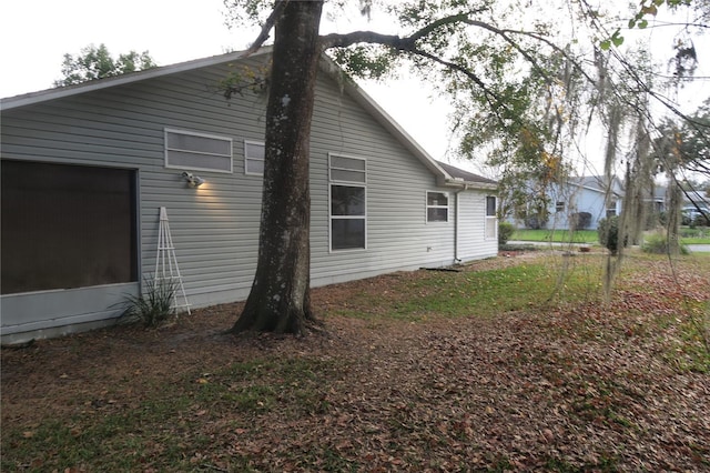 view of side of property featuring a garage