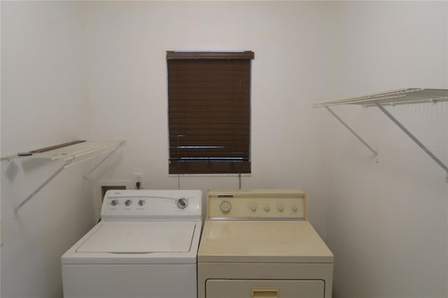 laundry room featuring washing machine and dryer