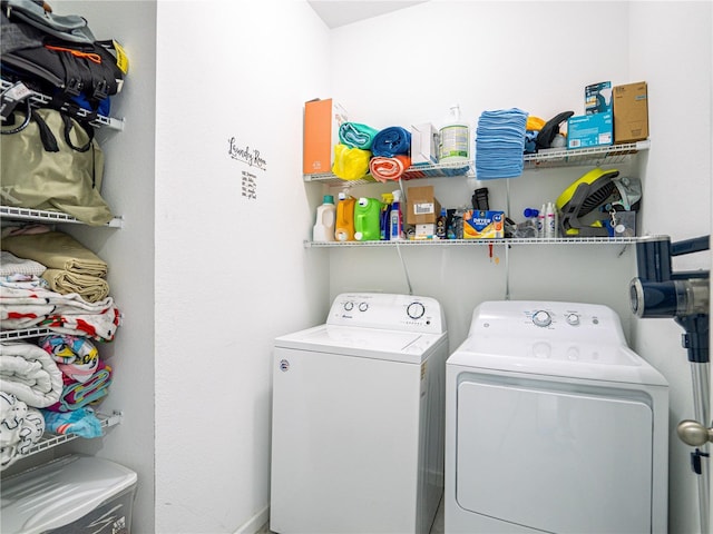 washroom featuring washing machine and dryer