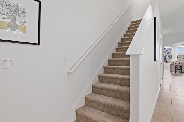 staircase with tile patterned flooring