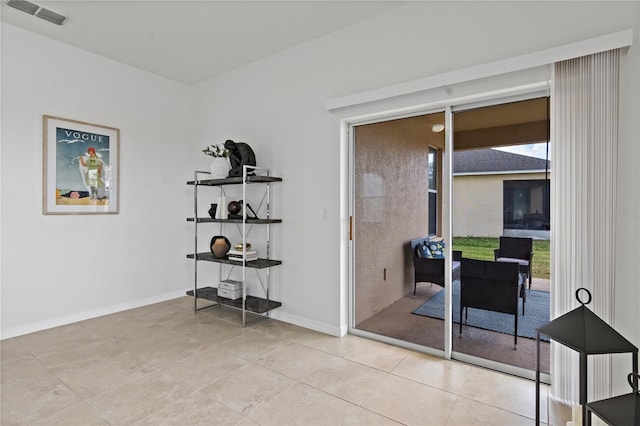 interior space with light tile patterned floors