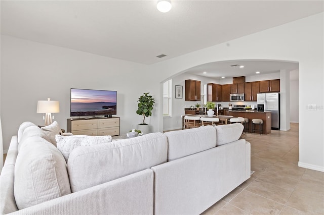 living room featuring light tile patterned flooring