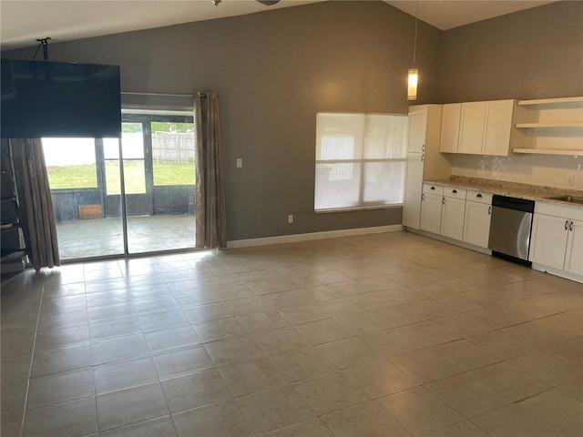 kitchen with pendant lighting, sink, white cabinetry, backsplash, and stainless steel dishwasher