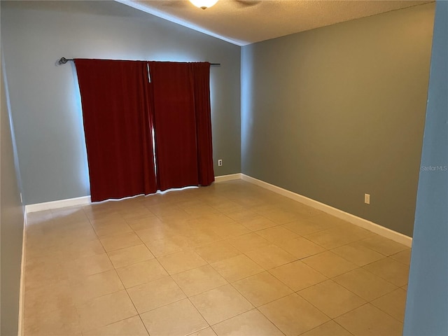 unfurnished bedroom with vaulted ceiling