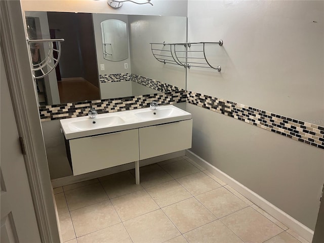 bathroom with tile patterned floors, vanity, and tile walls