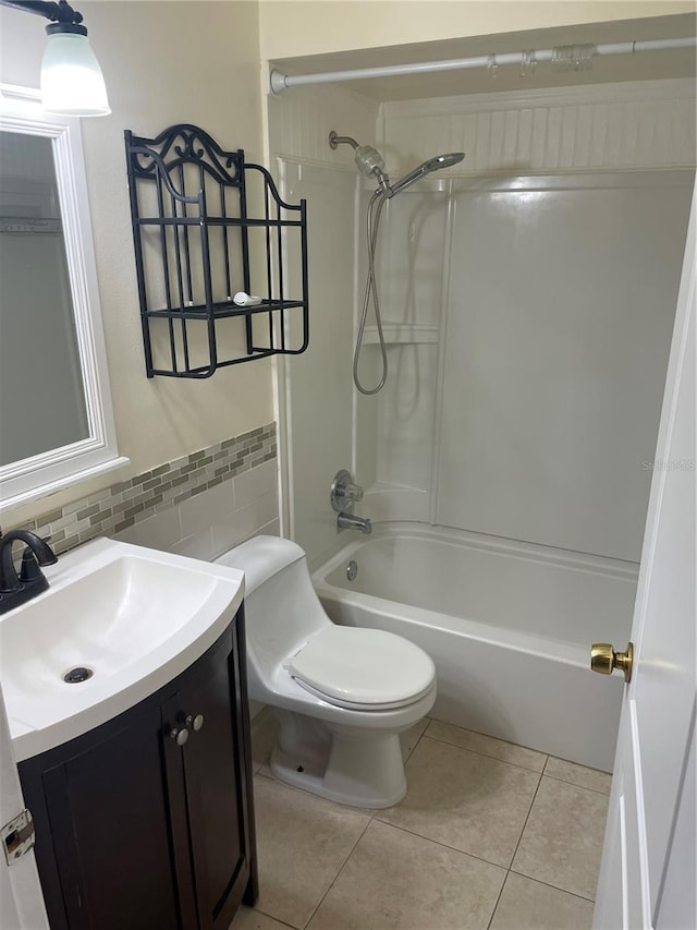 full bathroom featuring vanity, shower / tub combination, tile patterned floors, and toilet