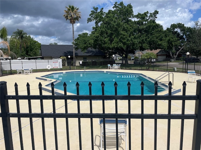 view of pool with a patio area