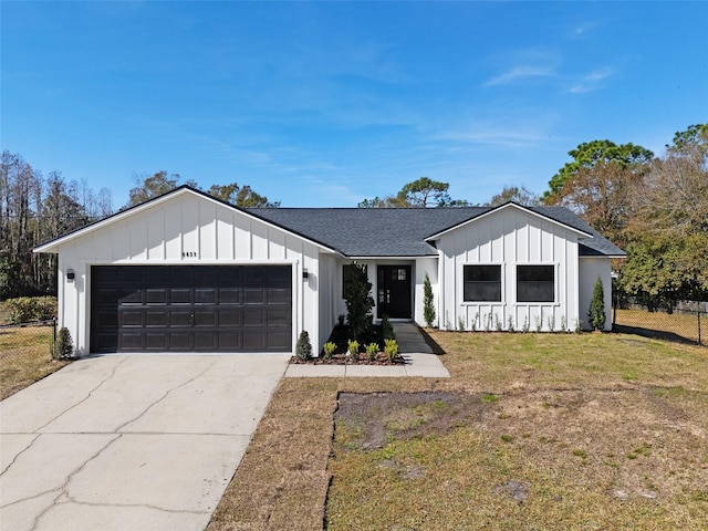 modern farmhouse style home with a garage and a front yard