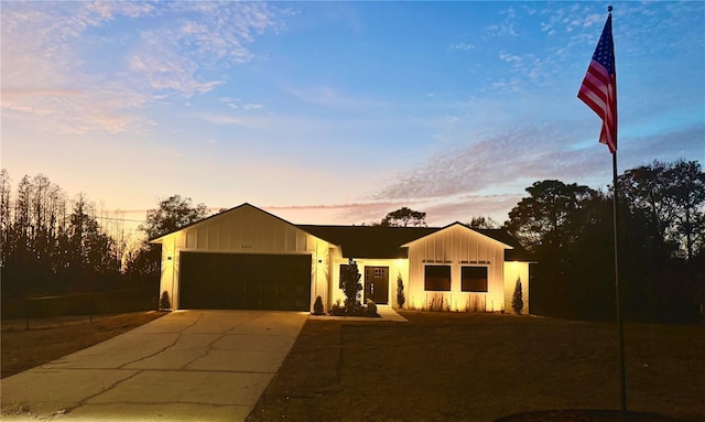 view of front of property with a garage