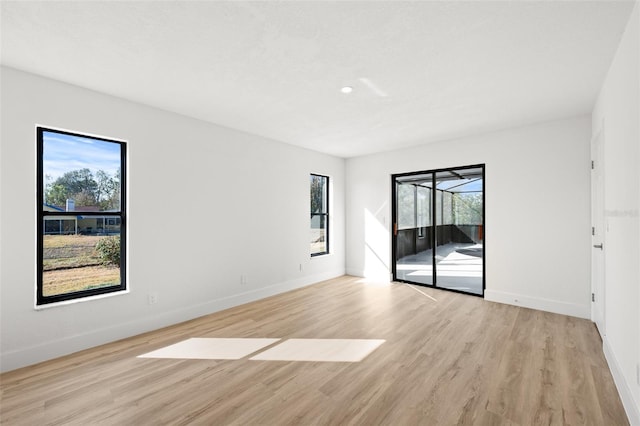 unfurnished room featuring light wood-type flooring