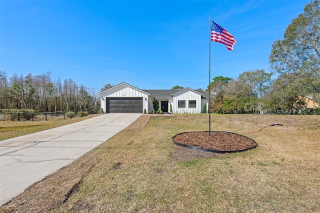 single story home featuring a garage and a front yard