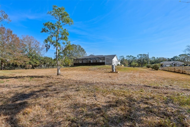 view of yard with a rural view