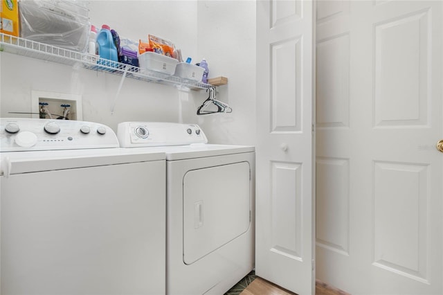 laundry room featuring washing machine and dryer