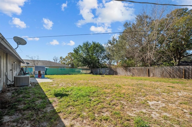 view of yard with central AC