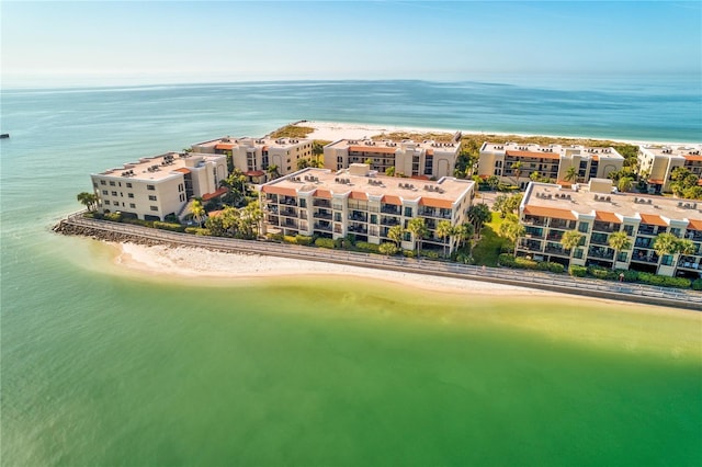 bird's eye view featuring a beach view and a water view