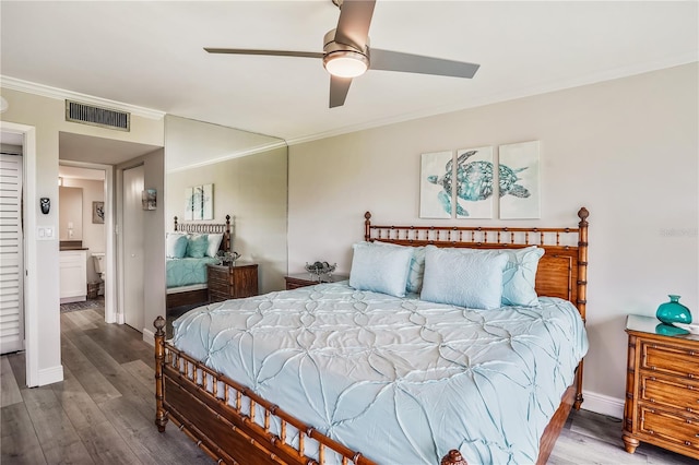 bedroom with wood-type flooring, ornamental molding, and ceiling fan