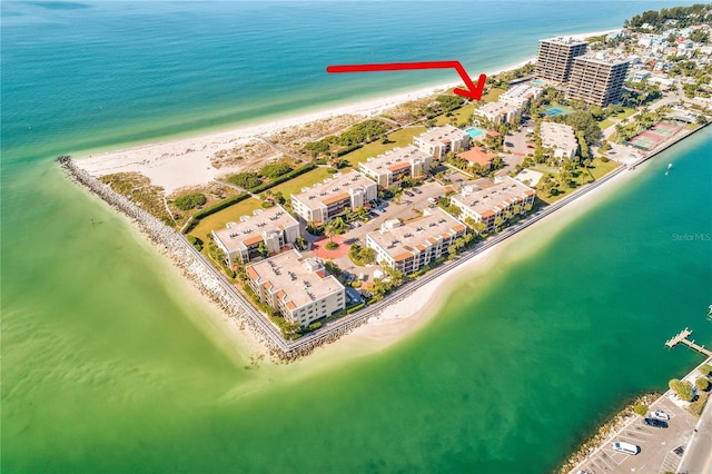 aerial view featuring a water view and a beach view