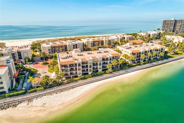 aerial view with a view of the beach and a water view