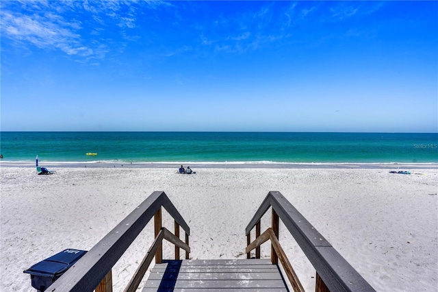 view of water feature with a beach view