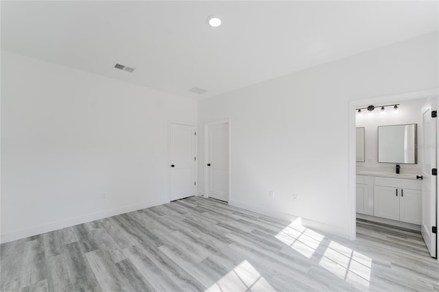 empty room featuring light hardwood / wood-style floors