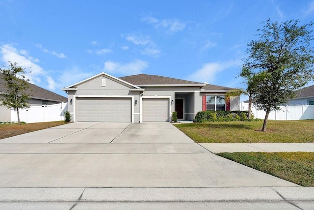 single story home with a garage and a front yard