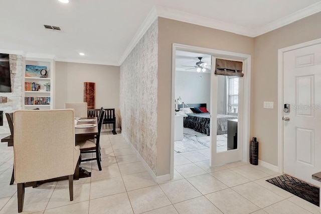 tiled dining space with ornamental molding