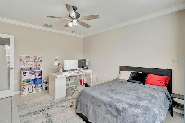 tiled bedroom with ornamental molding and ceiling fan