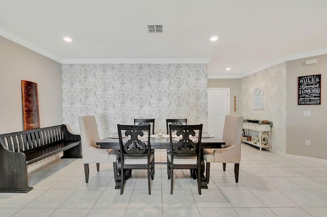 dining room featuring ornamental molding and light tile patterned floors