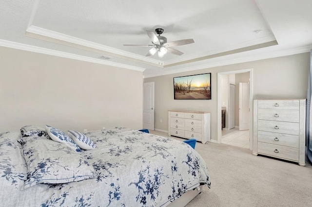 bedroom featuring light carpet, ornamental molding, a raised ceiling, and ceiling fan