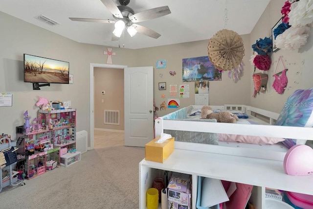 carpeted bedroom with ceiling fan