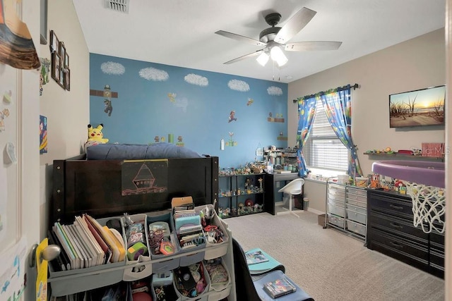 carpeted bedroom with ceiling fan