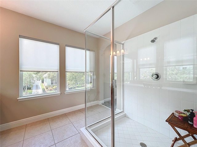 bathroom featuring walk in shower and tile patterned floors