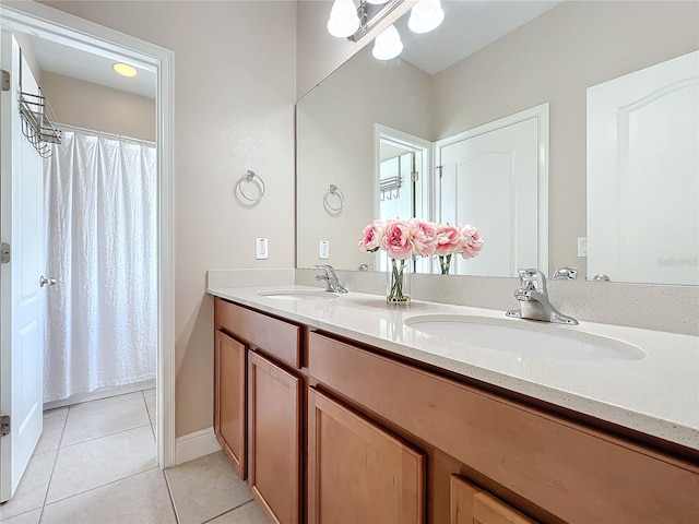 bathroom with vanity and tile patterned floors