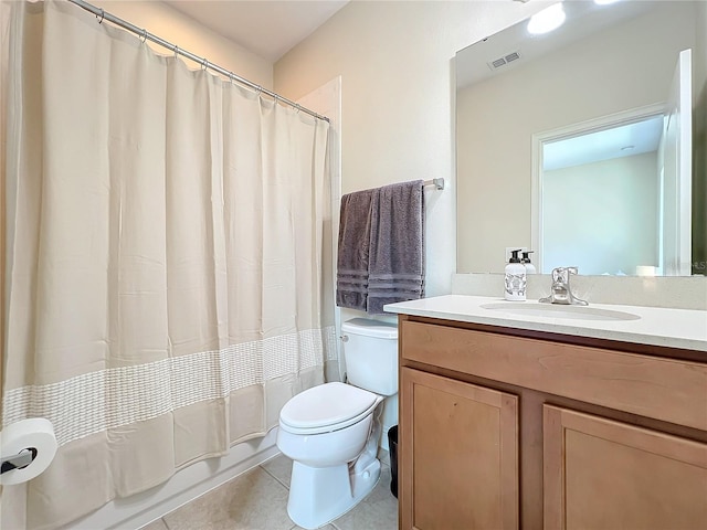 full bathroom featuring vanity, toilet, tile patterned flooring, and shower / bath combo with shower curtain