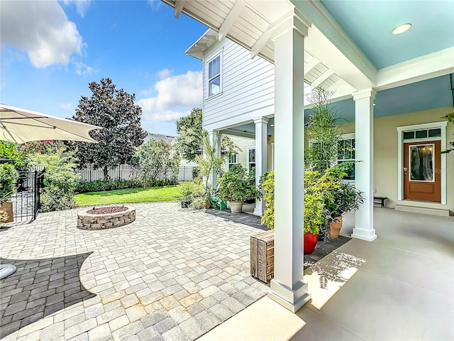 view of patio with a fire pit