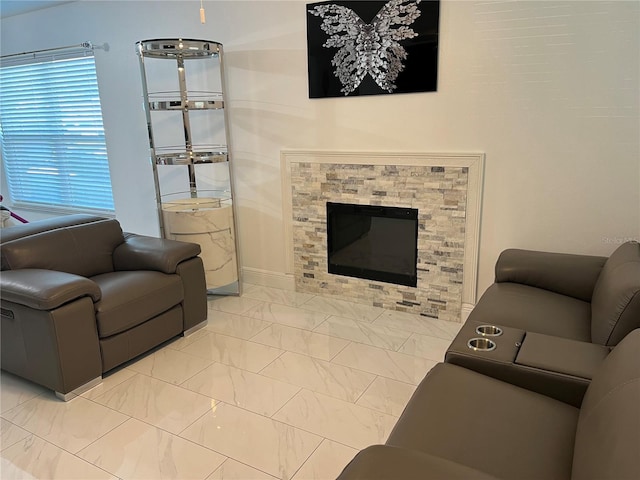 living room featuring a fireplace