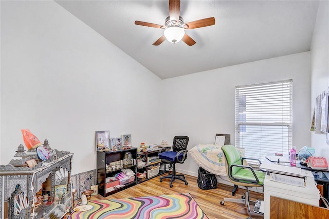 office area with ceiling fan, lofted ceiling, and light wood-type flooring