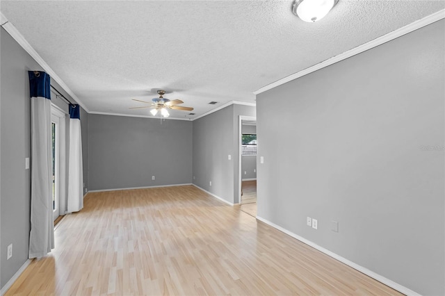 unfurnished room with ceiling fan, ornamental molding, light hardwood / wood-style flooring, and a textured ceiling