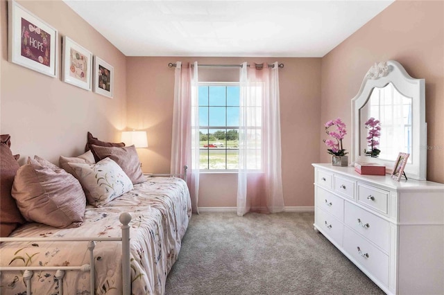 bedroom with light carpet