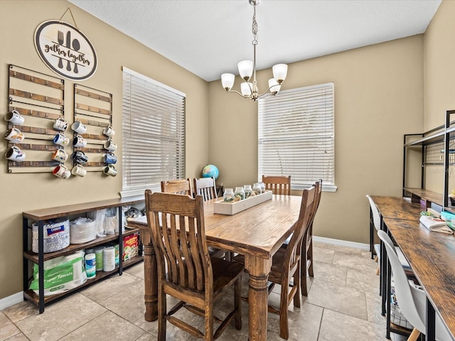 dining room with a chandelier