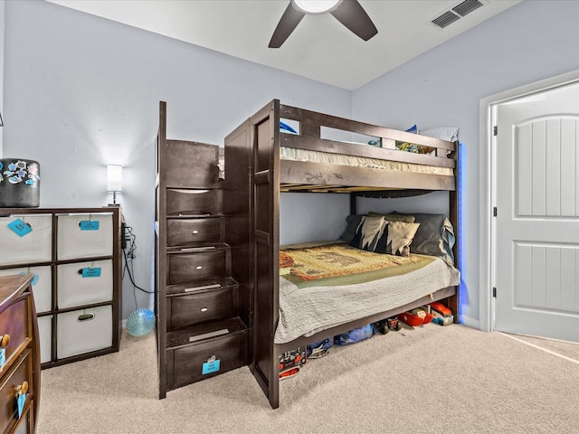 carpeted bedroom featuring ceiling fan