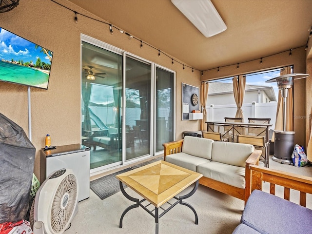 sunroom with rail lighting