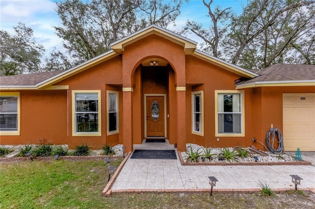 entrance to property with a garage